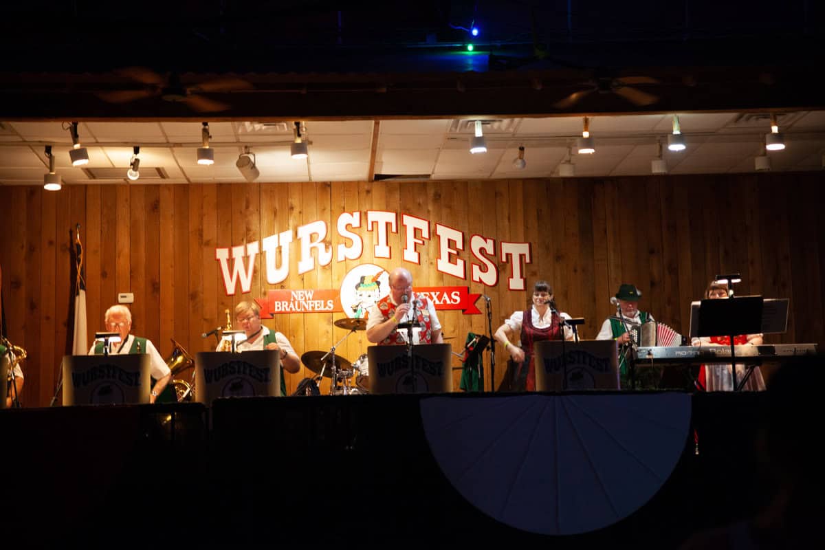 Band performing on stage at Wurstfest in New Braunfels, Texas