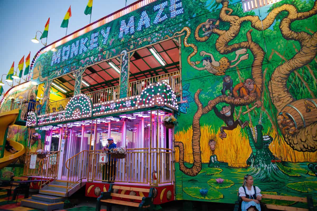 Colorful amusement park attraction titled 'Monkey Maze'