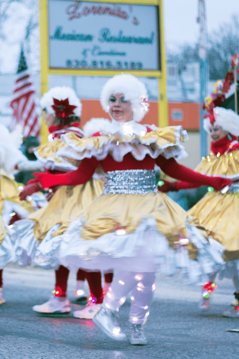 A lively group of people dressed in colorful costumes