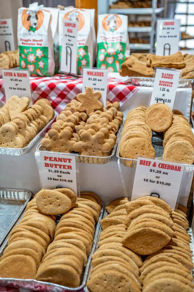 A display of assorted dog treats in various shapes