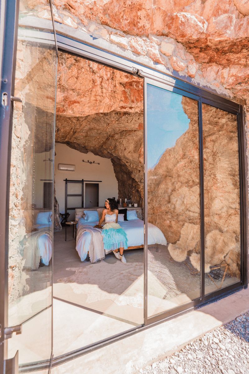 Glass doors opening into a cave suite at The Summit at Big Bend