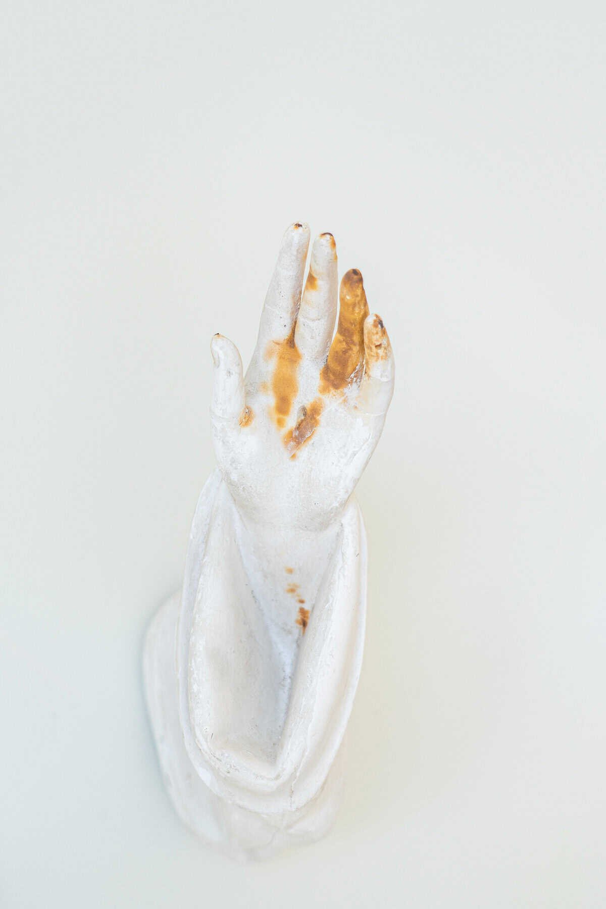 corsicana arts & entertainment district - hable gallery hand sculpture