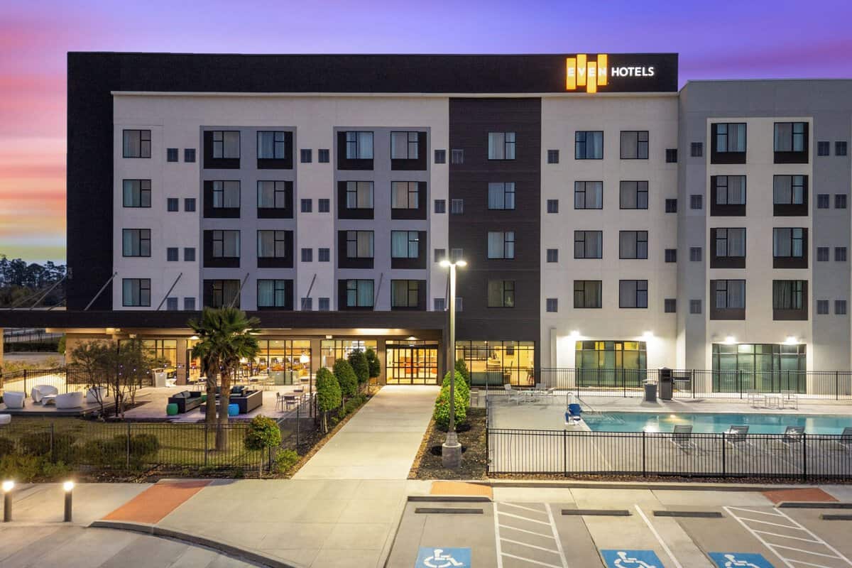 Exterior of EVEN Hotel Shenandoah The Woodlands at sunset