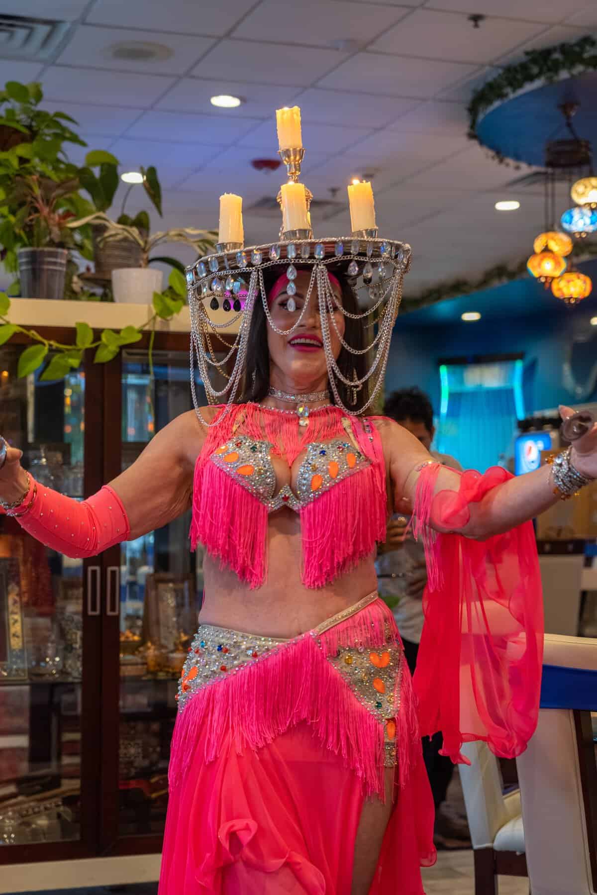 Belly dancer with candles at Lama Mediterranean Cuisine