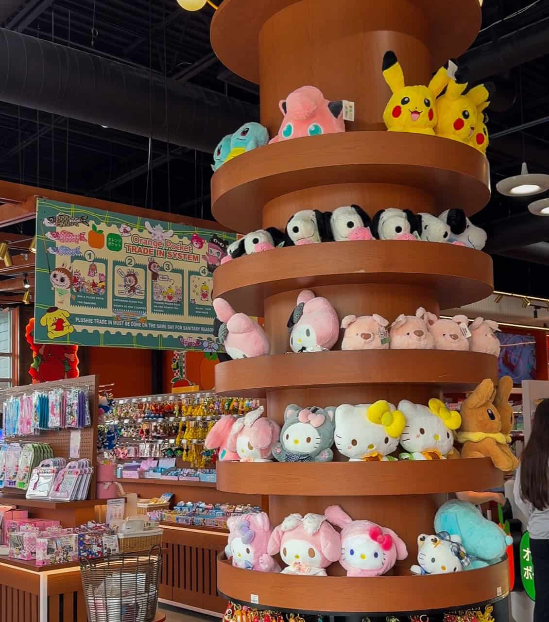 Plush toy display shelves inside Orange Pocket in Shenandoah, Texas