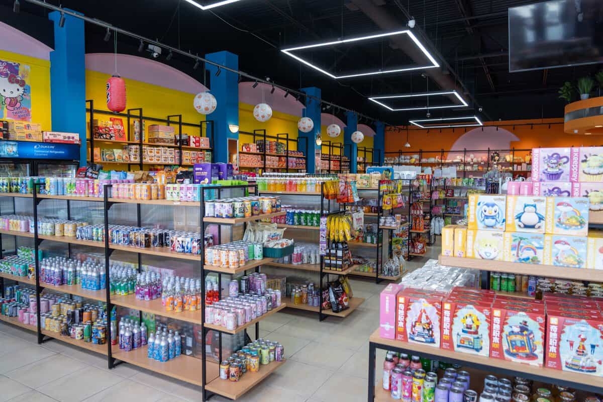Shelves of snacks and anime merchandise at Violet Kpop Anime Market