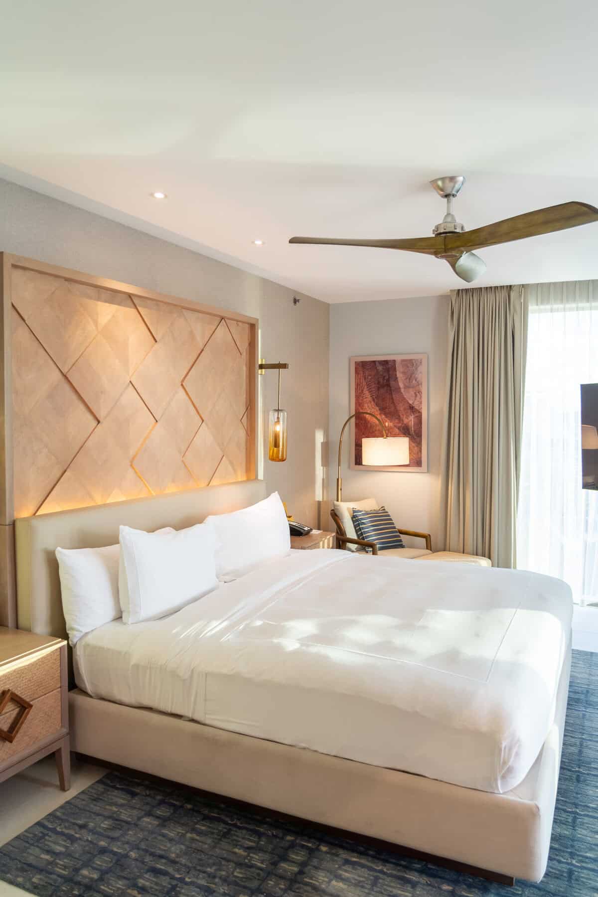King bed in an ocean view suite at Conrad Punta de Mita.