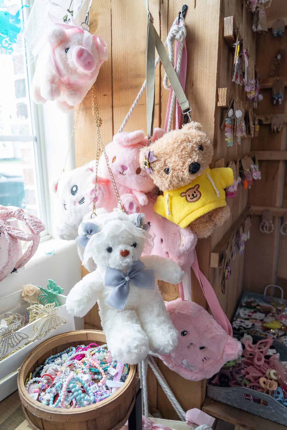 Stuffed animals and bows displayed in the Craft Chicks boutique