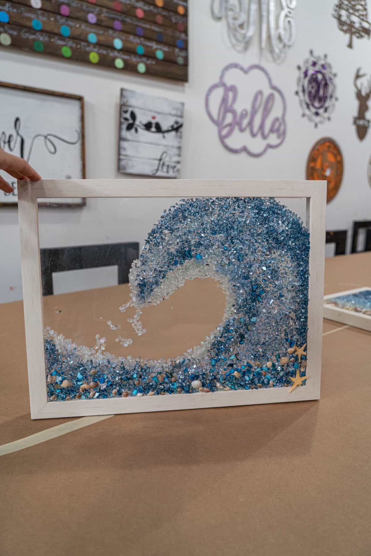A finished resin wave art project at Craft Chicks in Tomball