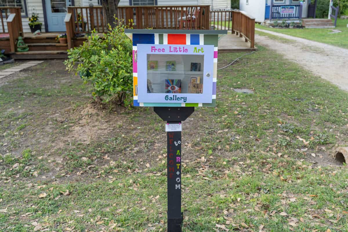 Little Free Art Gallery in Tomball with colorful art and plants
