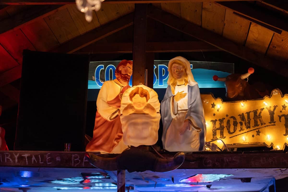 Stage decor and music memorabilia inside Old Tomball Honky Tonk