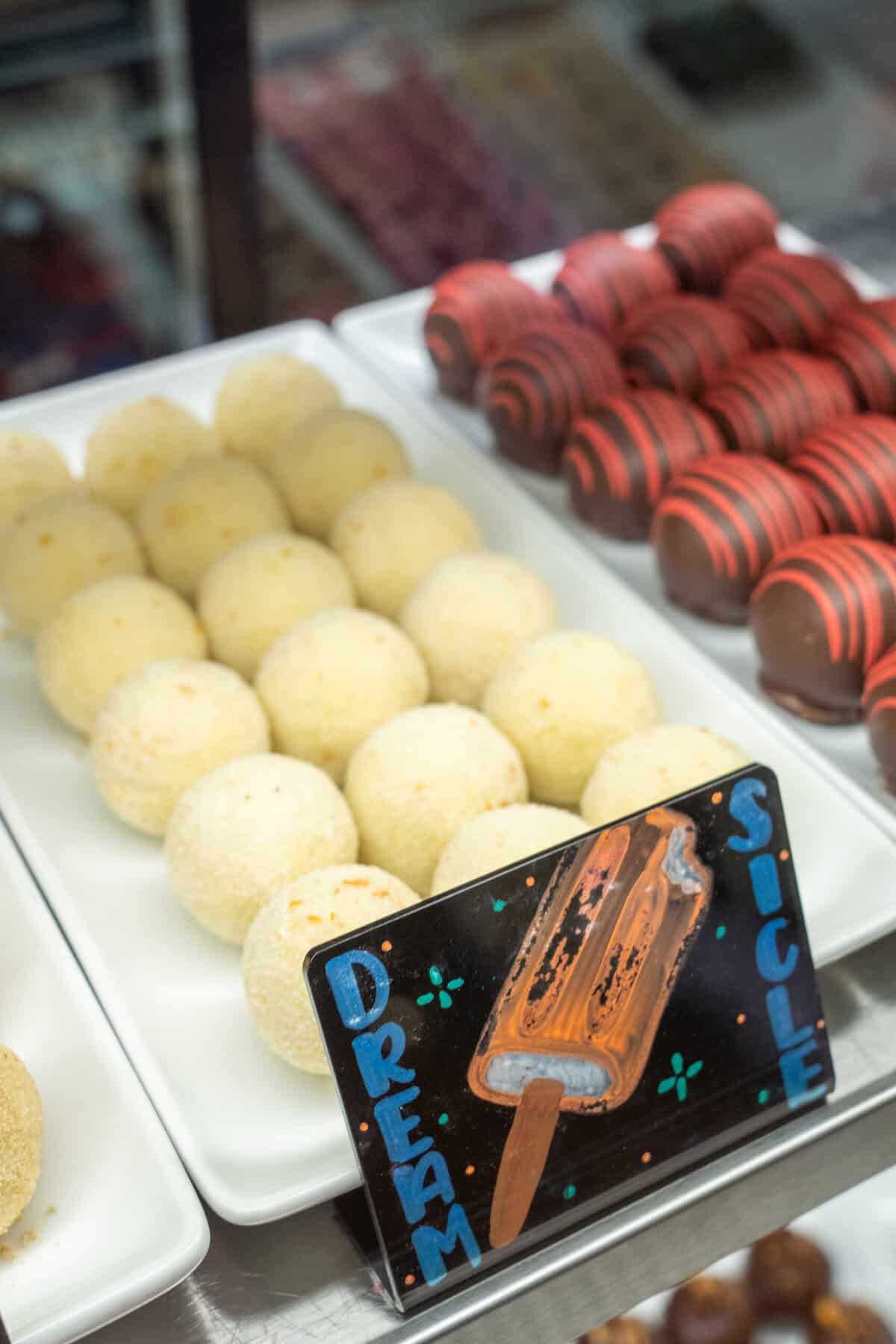 Rows of handcrafted chocolates on display at Tejas Chocolate and Barbecue