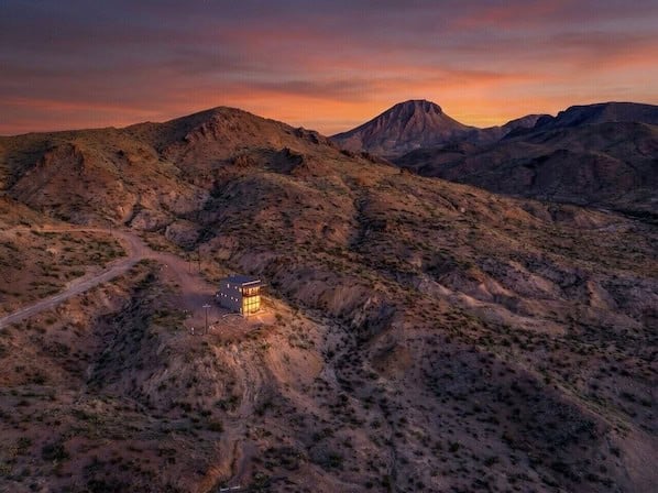 Aerial view of the Infinite Skies Retreat airplane home near Big Bend