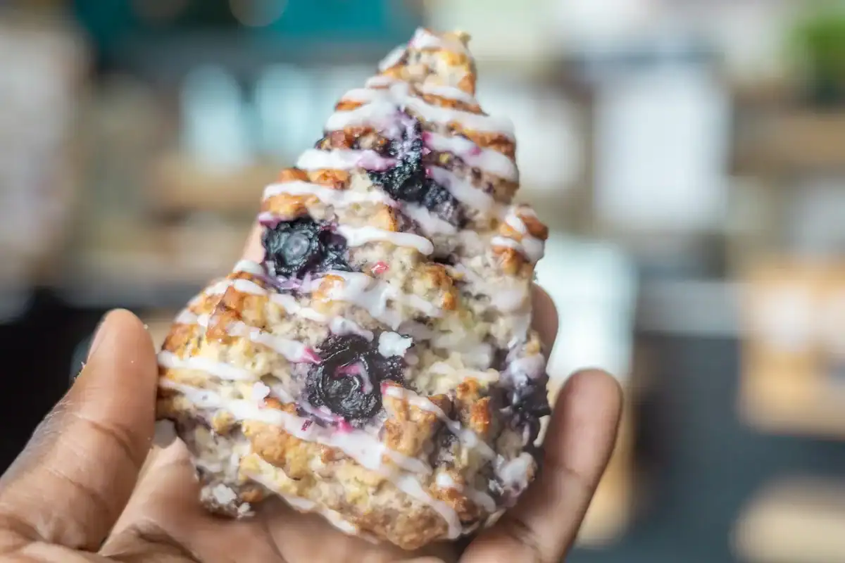 Blueberry sourdough cinnamon roll from Knead Me Bakery