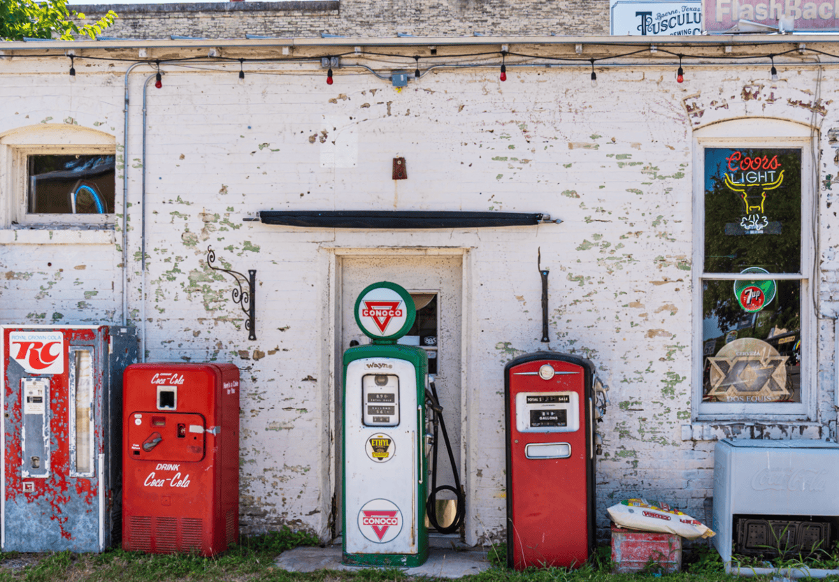 Vintage gas pumps and storefront along the Hill Country Mile in Boerne, Texas