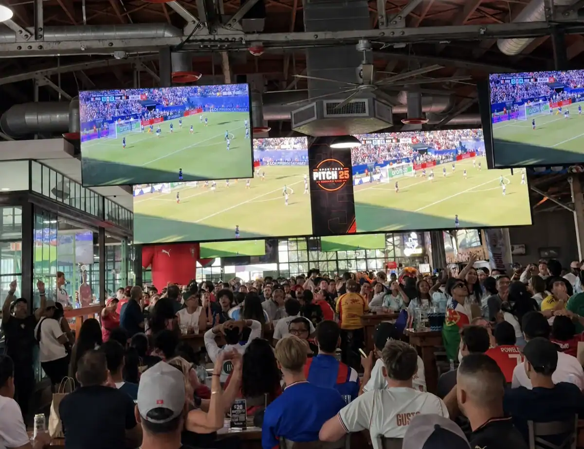 Soccer fans watching a World Cup match on the screens at Pitch 25 in Houston