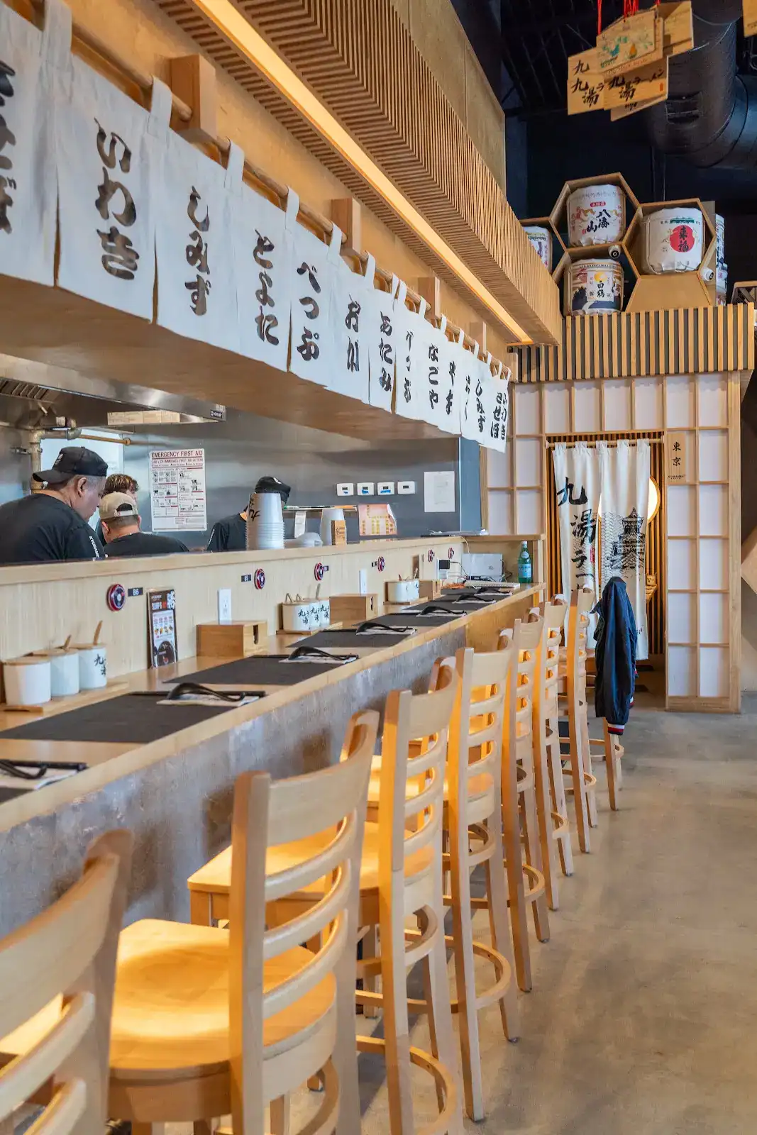 Counter and warm wood interior at Kyuramen in Shenandoah