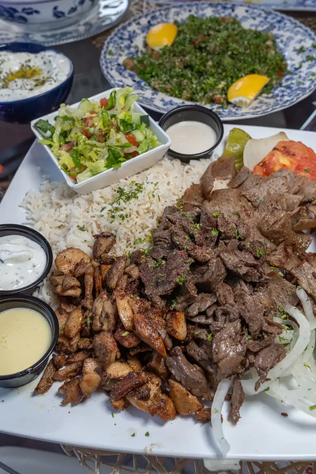Large mixed meat platter with rice and salads at Lama Mediterranean Cuisine