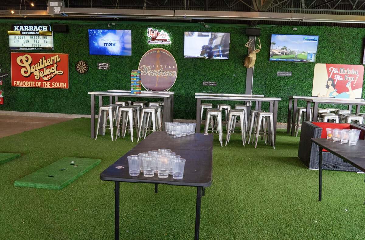 Patio games and seating at Little Woodrow’s in Tomball