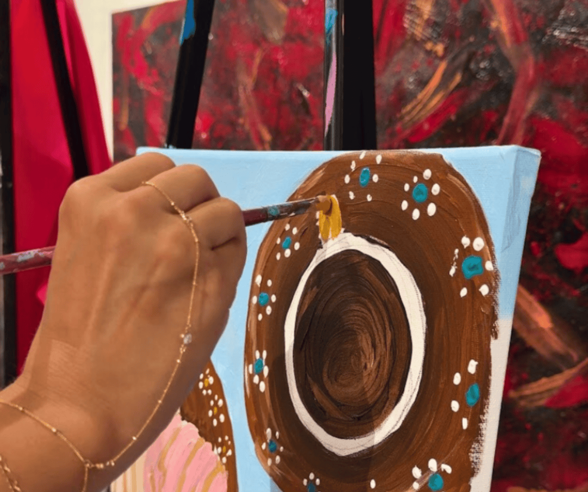 Painting with a Twist class in Tomball with canvas painting in progress