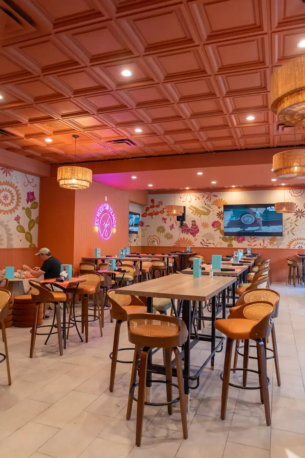 Colorful dining room inside Sin Yolanda in Shenandoah