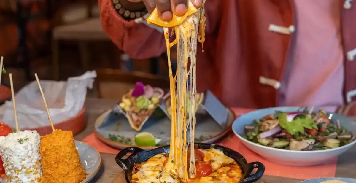 Queso fundido, elote, and tacos at Sin Yolanda in Shenandoah