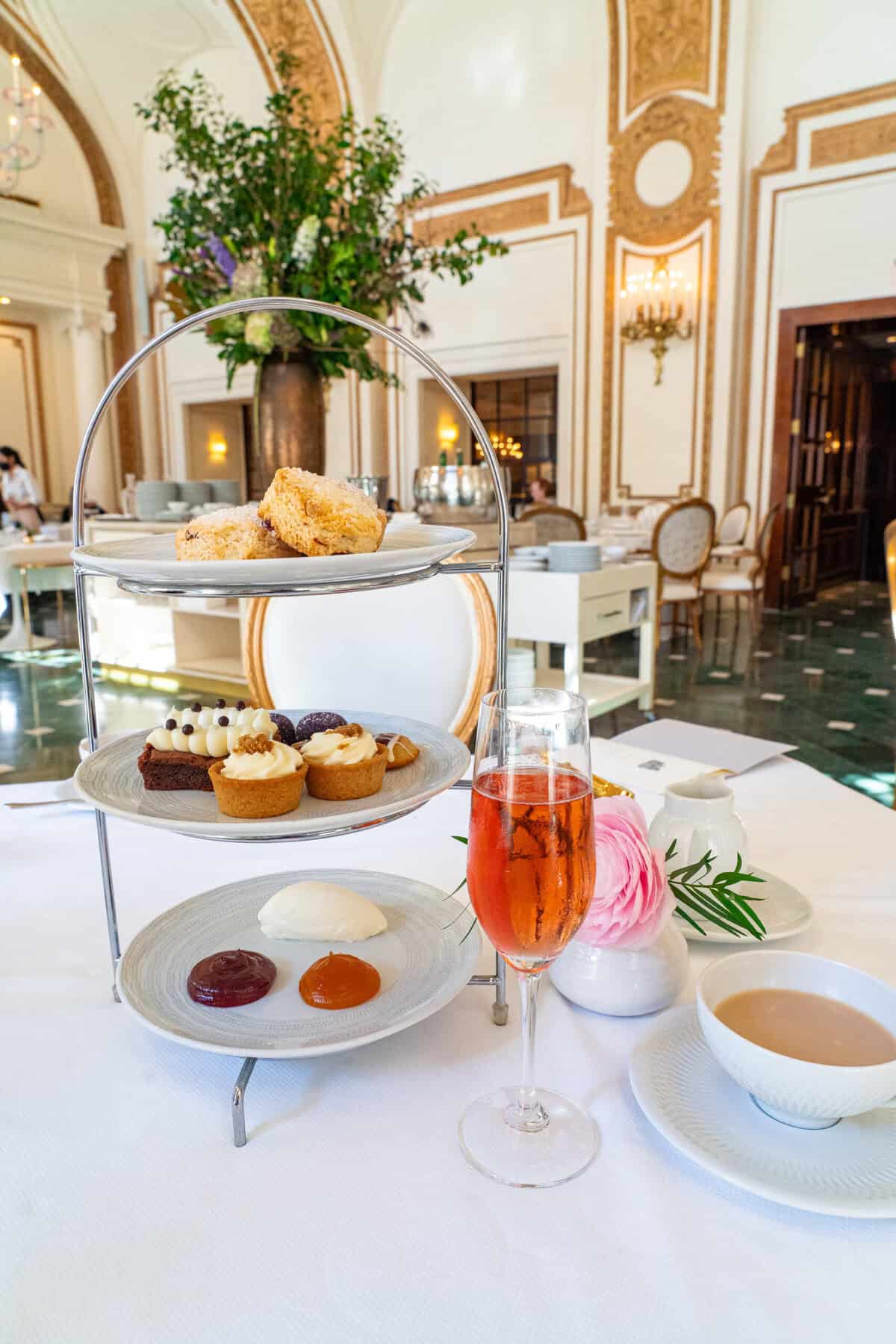 Afternoon tea service inside The Adolphus Hotel in Dallas.