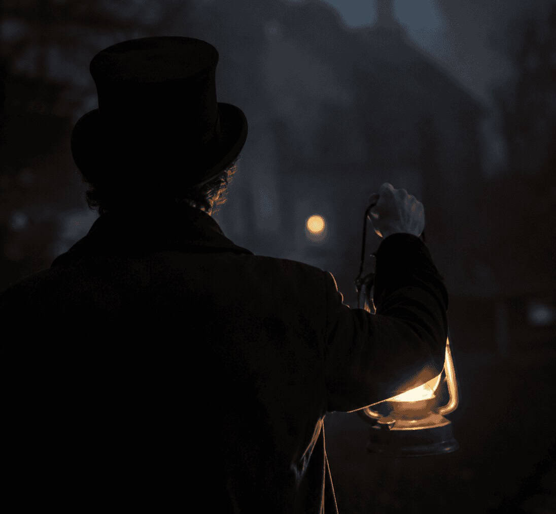 Lantern-lit guide representing the Tomball Ghost Tour
